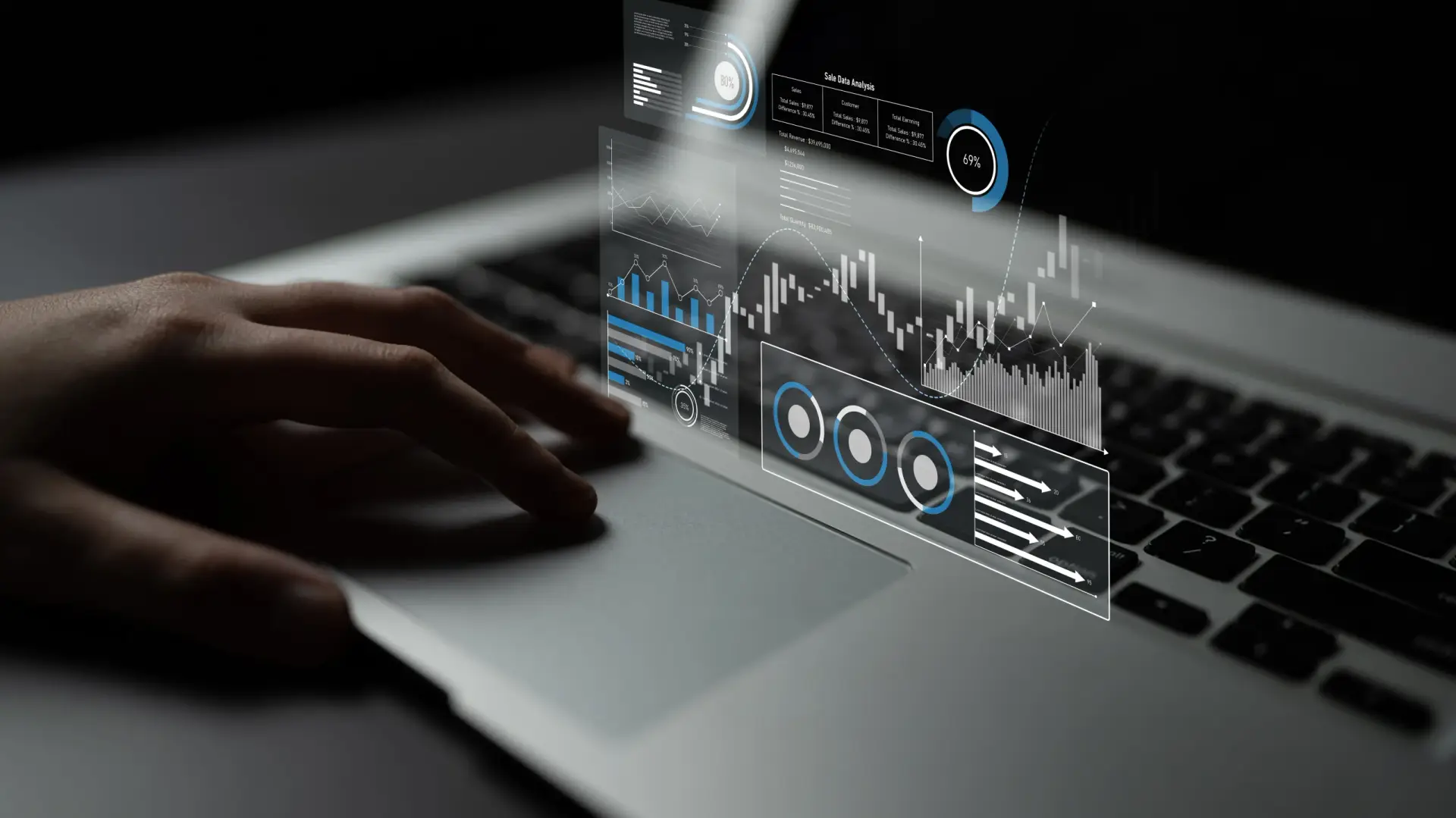 A laptop with overlaid charts illustrating investment research and risk analysis.
